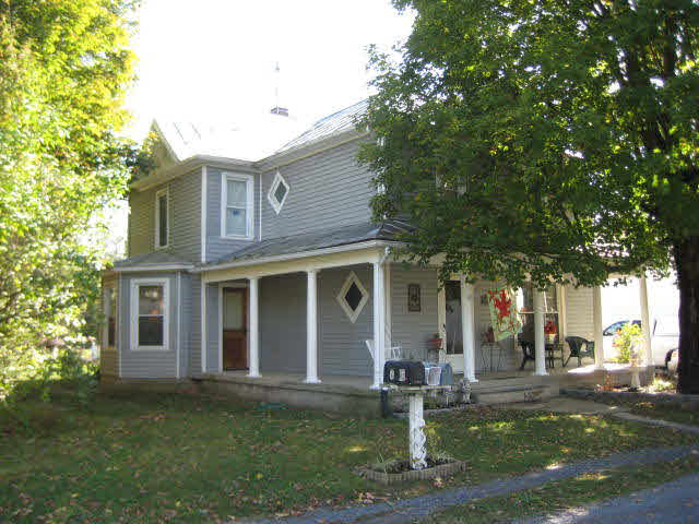 76 Grindstone Road Bridgewater, VA 22812 - Photo 1 of 1 a front view of a house with a yard