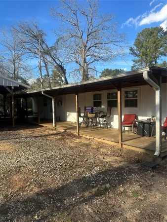 a view of a backyard with a patio