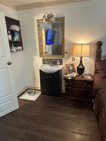 a view of a sink and a mirror