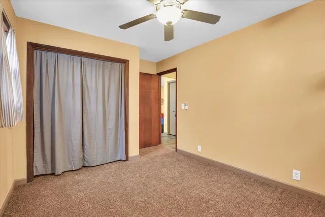 a view of a workspace with furniture