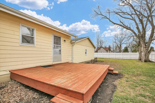 a view of outdoor space with garden and trees