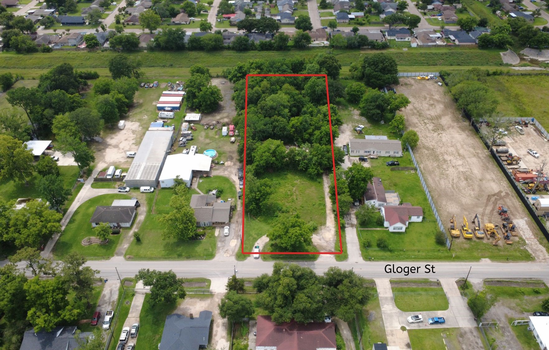11921 Gloger Street Houston, TX 77039 - Photo 1 of 5 an aerial view of a city