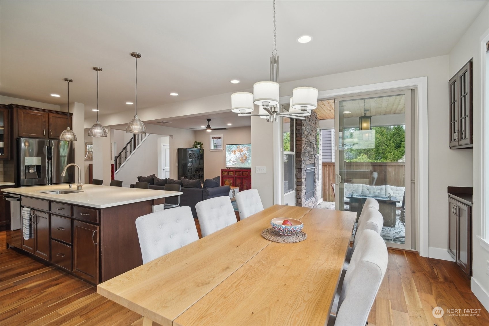 4111 Strumme Road Bothell, WA 98012 - Photo 11 of 39 a large kitchen with a table and chairs
