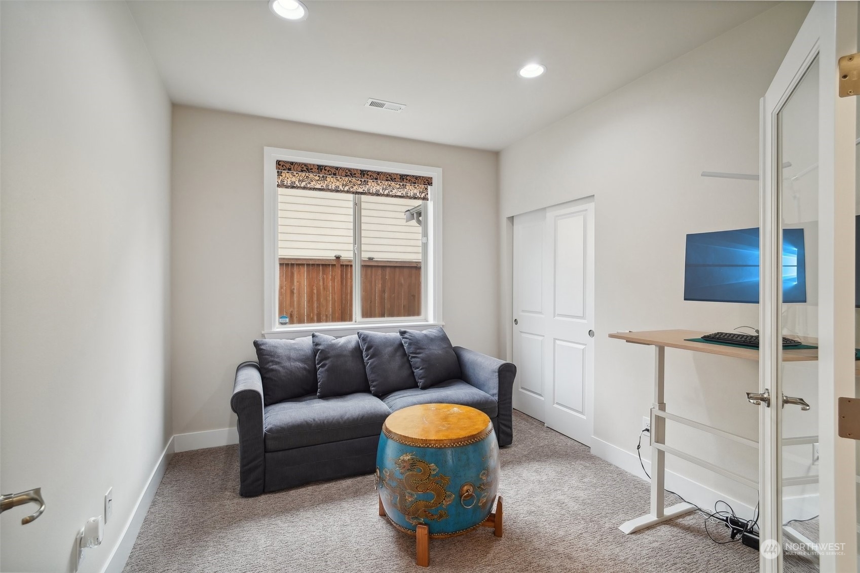 4111 Strumme Road Bothell, WA 98012 - Photo 12 of 39 a living room with furniture and white walls