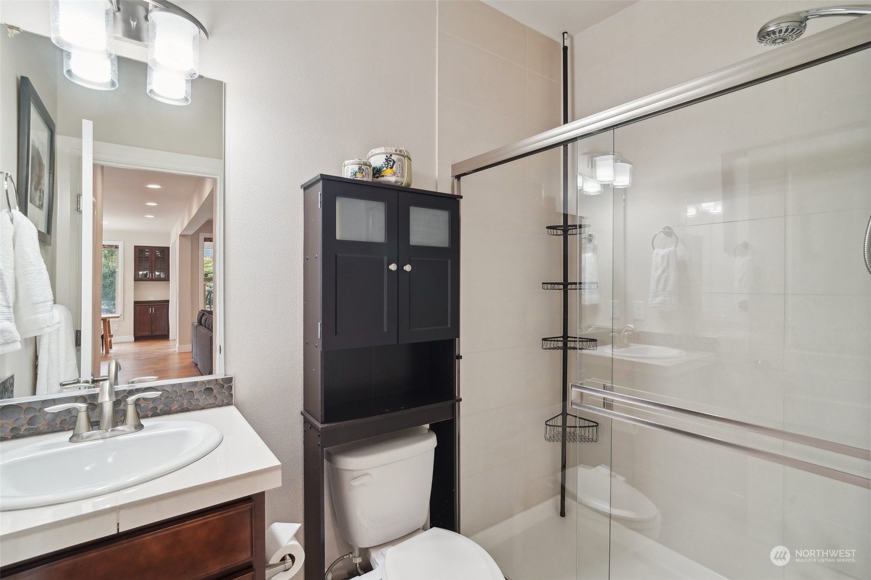 4111 Strumme Road Bothell, WA 98012 - Photo 13 of 39 a bathroom with a sink toilet and shower