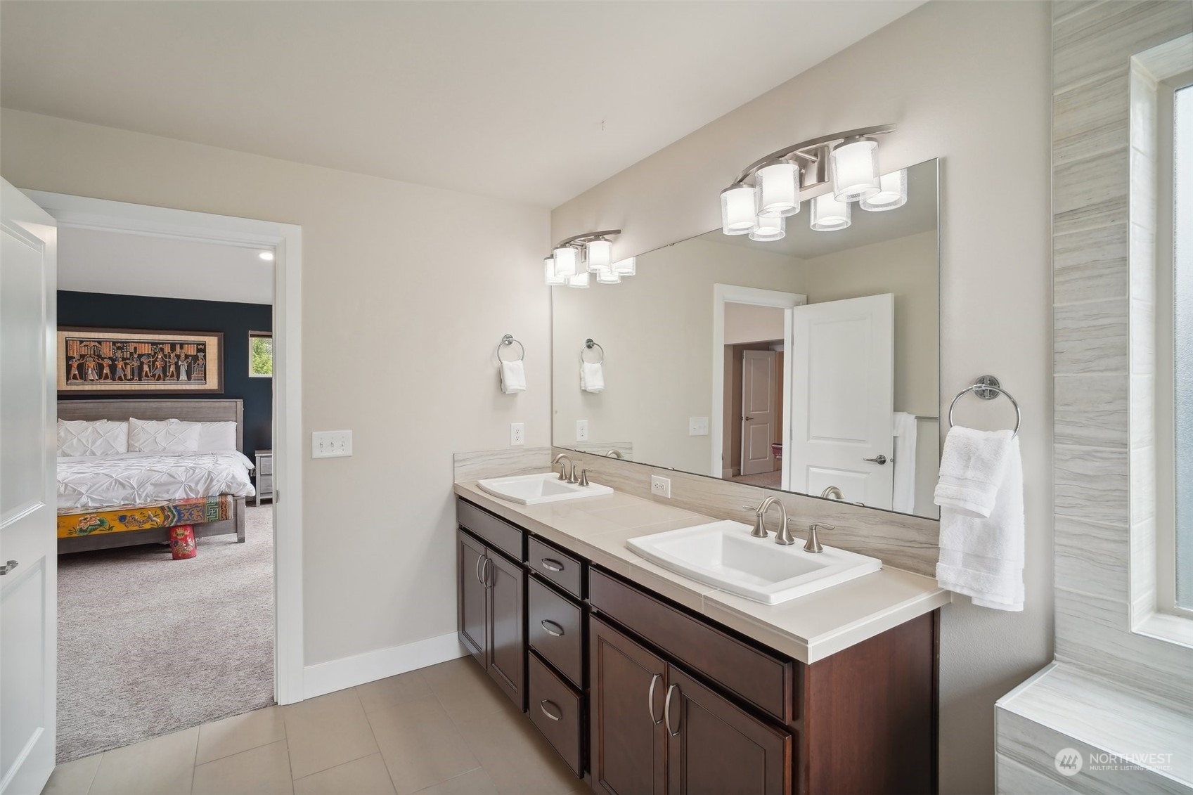 4111 Strumme Road Bothell, WA 98012 - Photo 18 of 39 a bathroom with a sink and a mirror