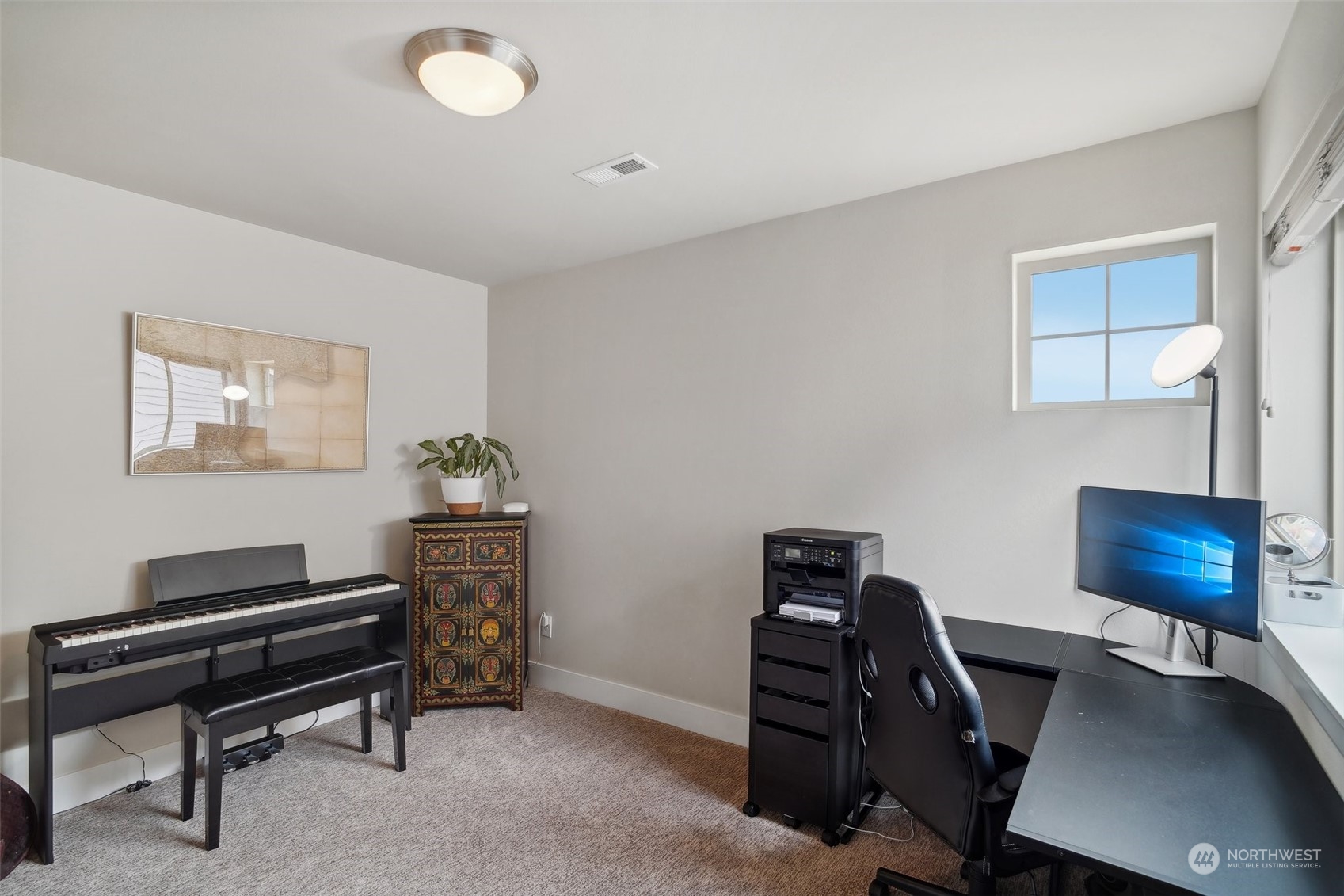 4111 Strumme Road Bothell, WA 98012 - Photo 24 of 39 a view of a workspace with furniture