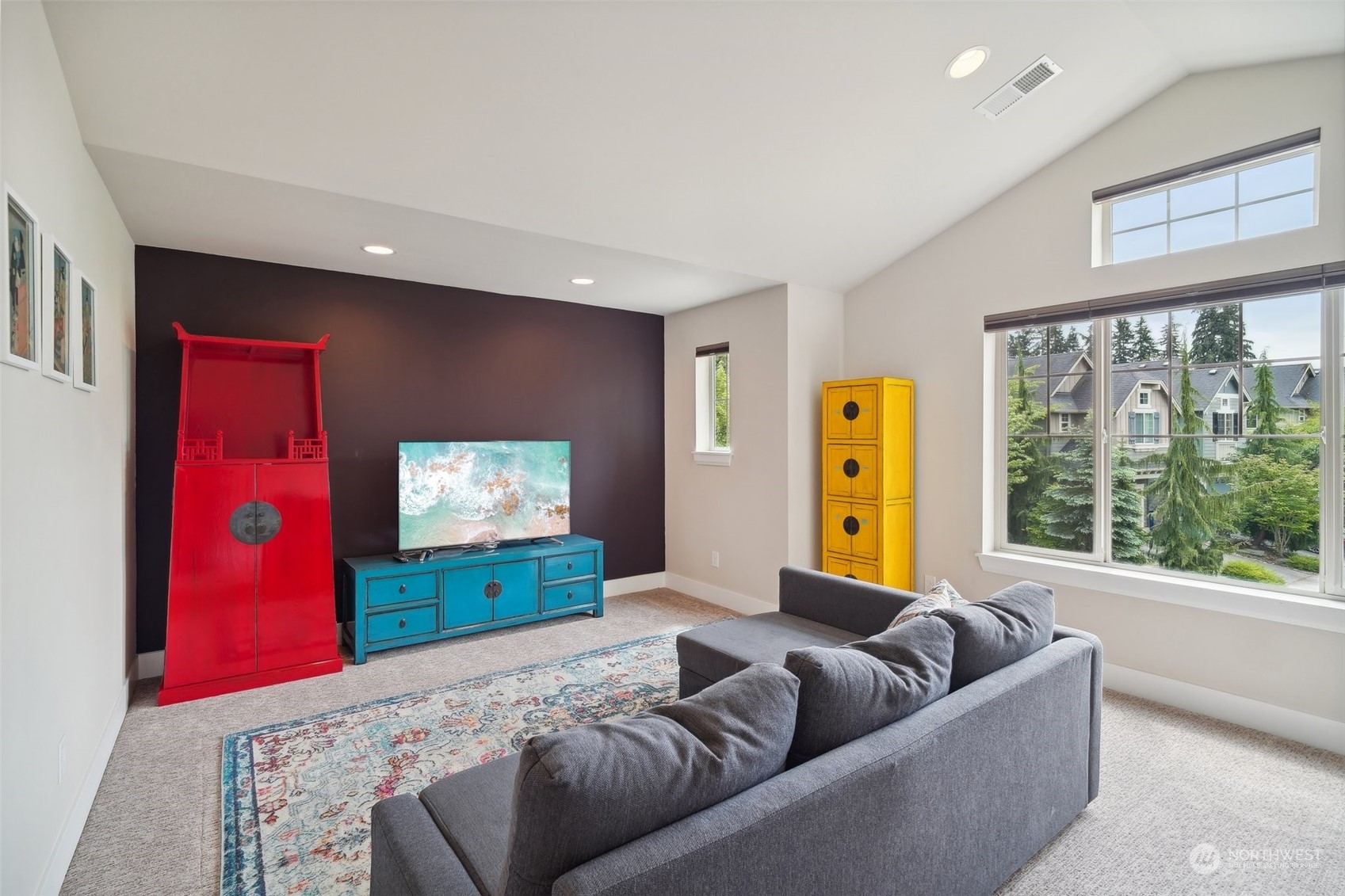 4111 Strumme Road Bothell, WA 98012 - Photo 29 of 39 a living room with furniture window and flat screen tv