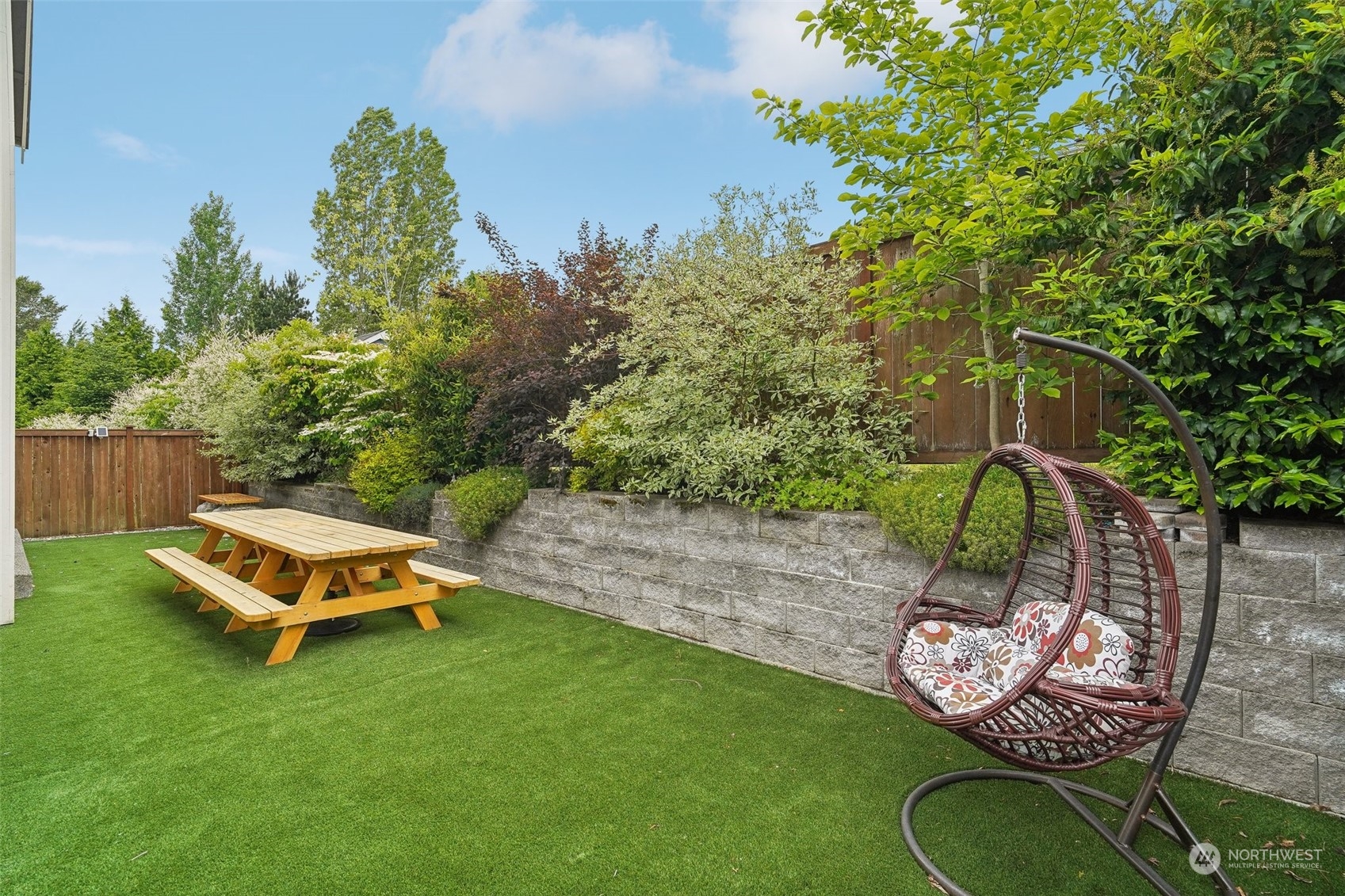 4111 Strumme Road Bothell, WA 98012 - Photo 32 of 39 a garden view with a seating space