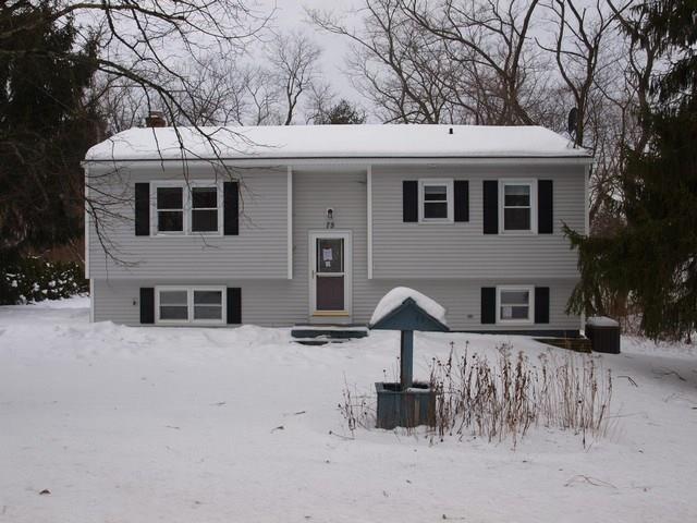 75 Gauthier Avenue Killingly, CT 06239 - Photo 1 of 1 a front view of a house with a yard