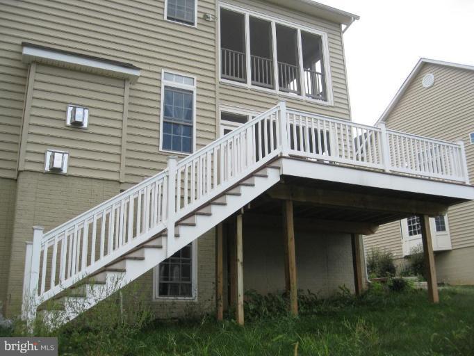8932 Ricky Trevor Road Perry Hall, MD 21128 - Photo 3 of 16 a view of a house with backyard and deck