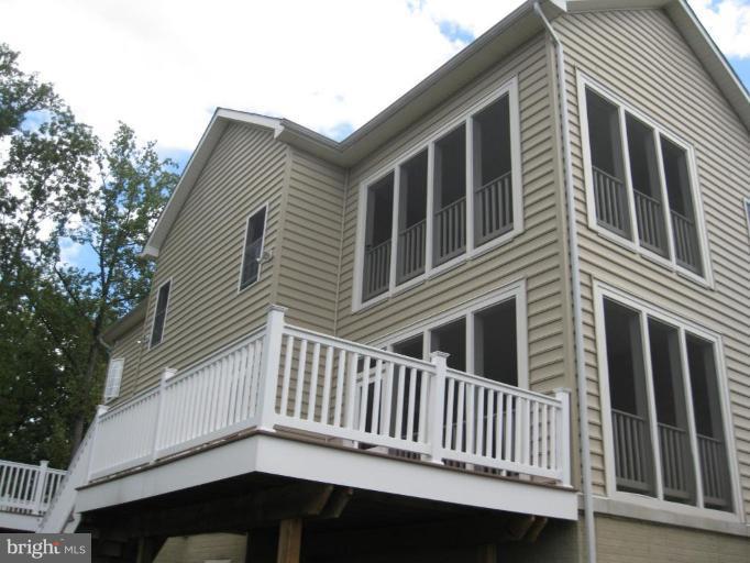 8932 Ricky Trevor Road Perry Hall, MD 21128 - Photo 8 of 16 a view of a house with a deck