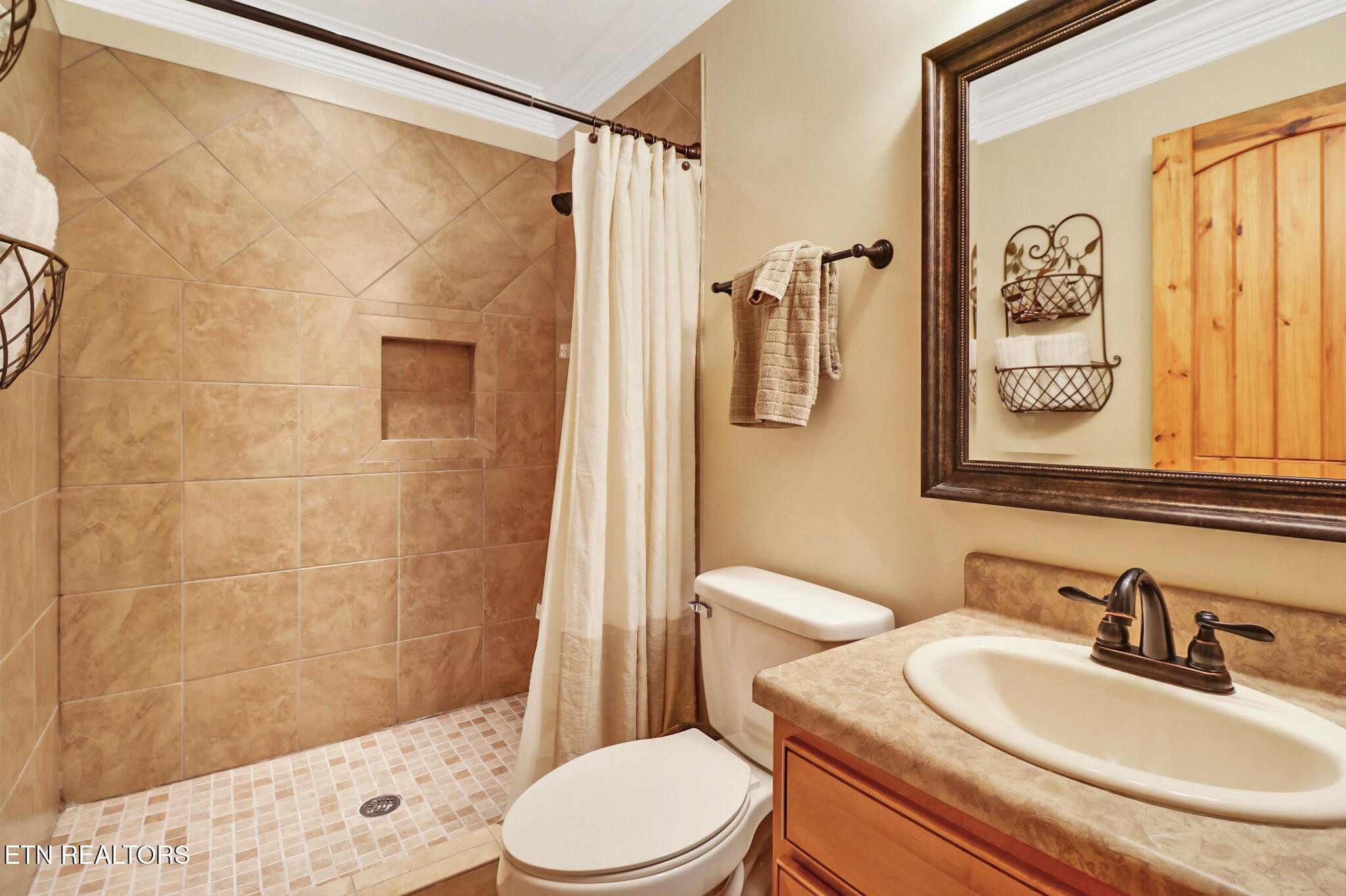 232 Victoria Circle Jamestown, TN 38556 - Photo 19 of 58 a bathroom with a sink toilet and shower