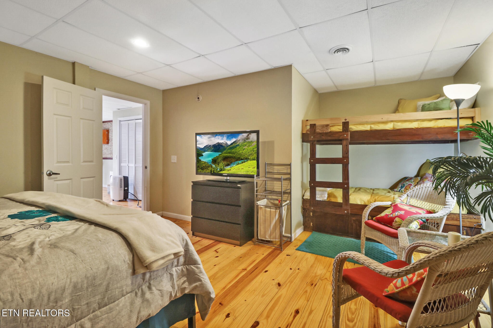 232 Victoria Circle Jamestown, TN 38556 - Photo 23 of 58 a bedroom with a bed and a tv