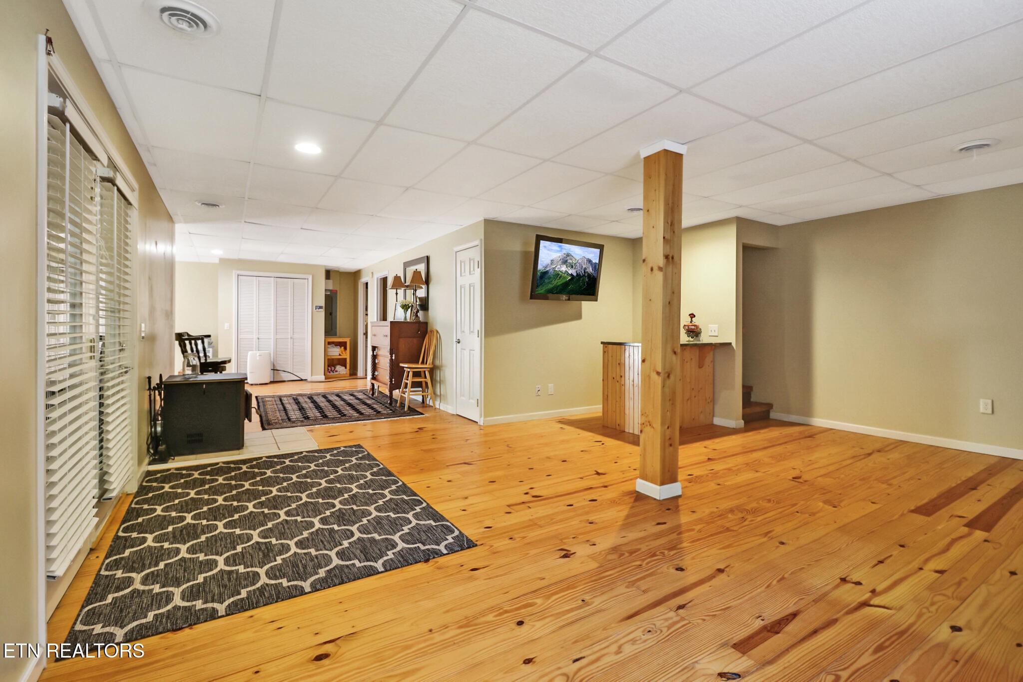 232 Victoria Circle Jamestown, TN 38556 - Photo 25 of 58 a bedroom with a bed and a couch