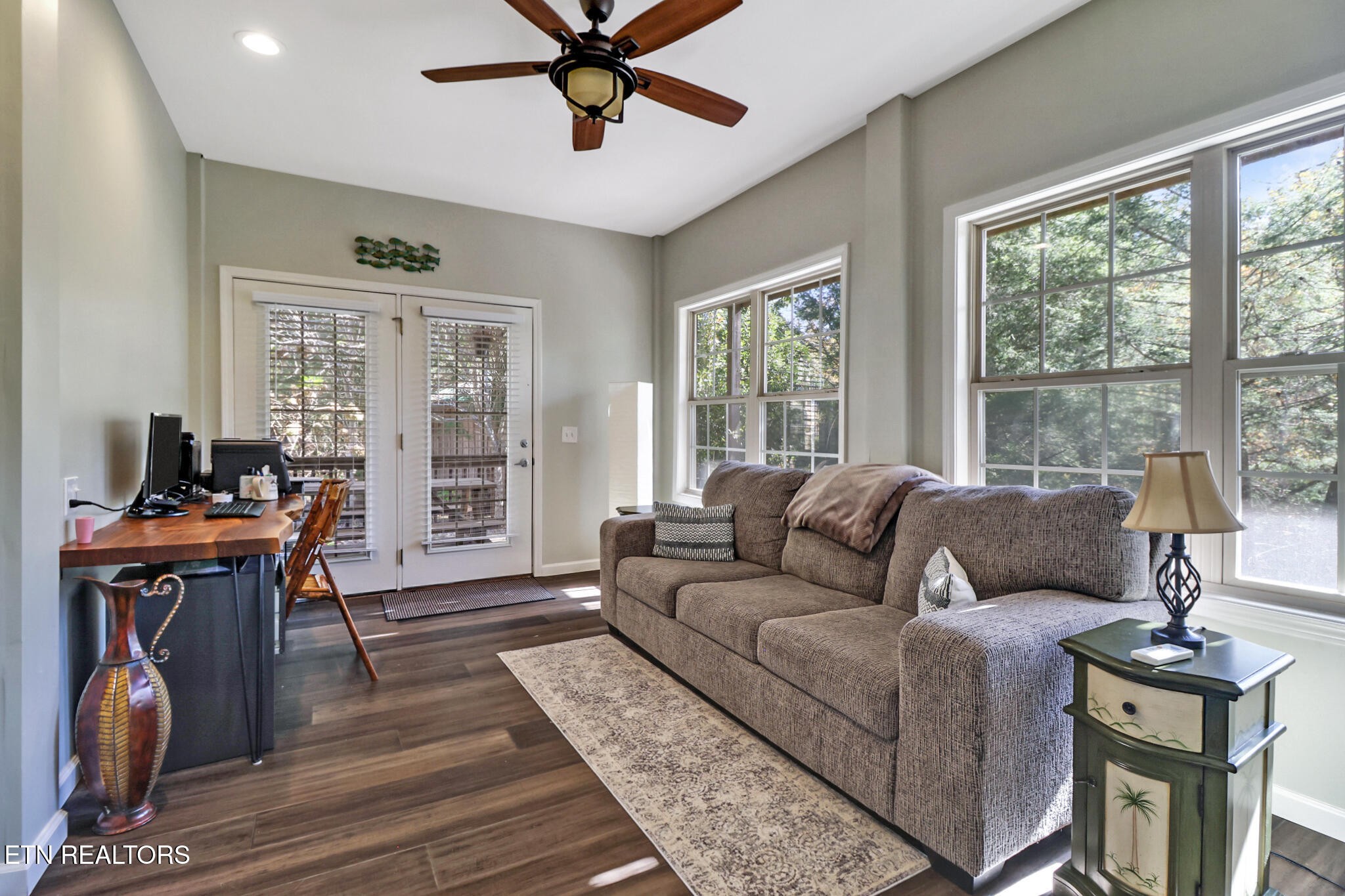 232 Victoria Circle Jamestown, TN 38556 - Photo 28 of 58 a living room with furniture a ceiling fan and a window