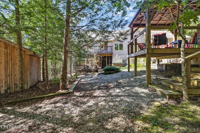 a backyard of a house with lots of green space