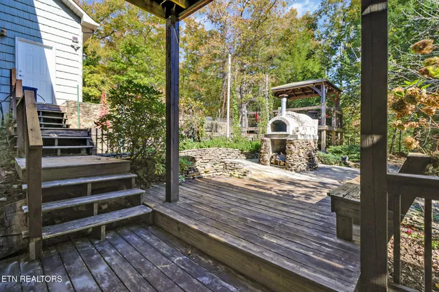 a view of balcony with wooden floor