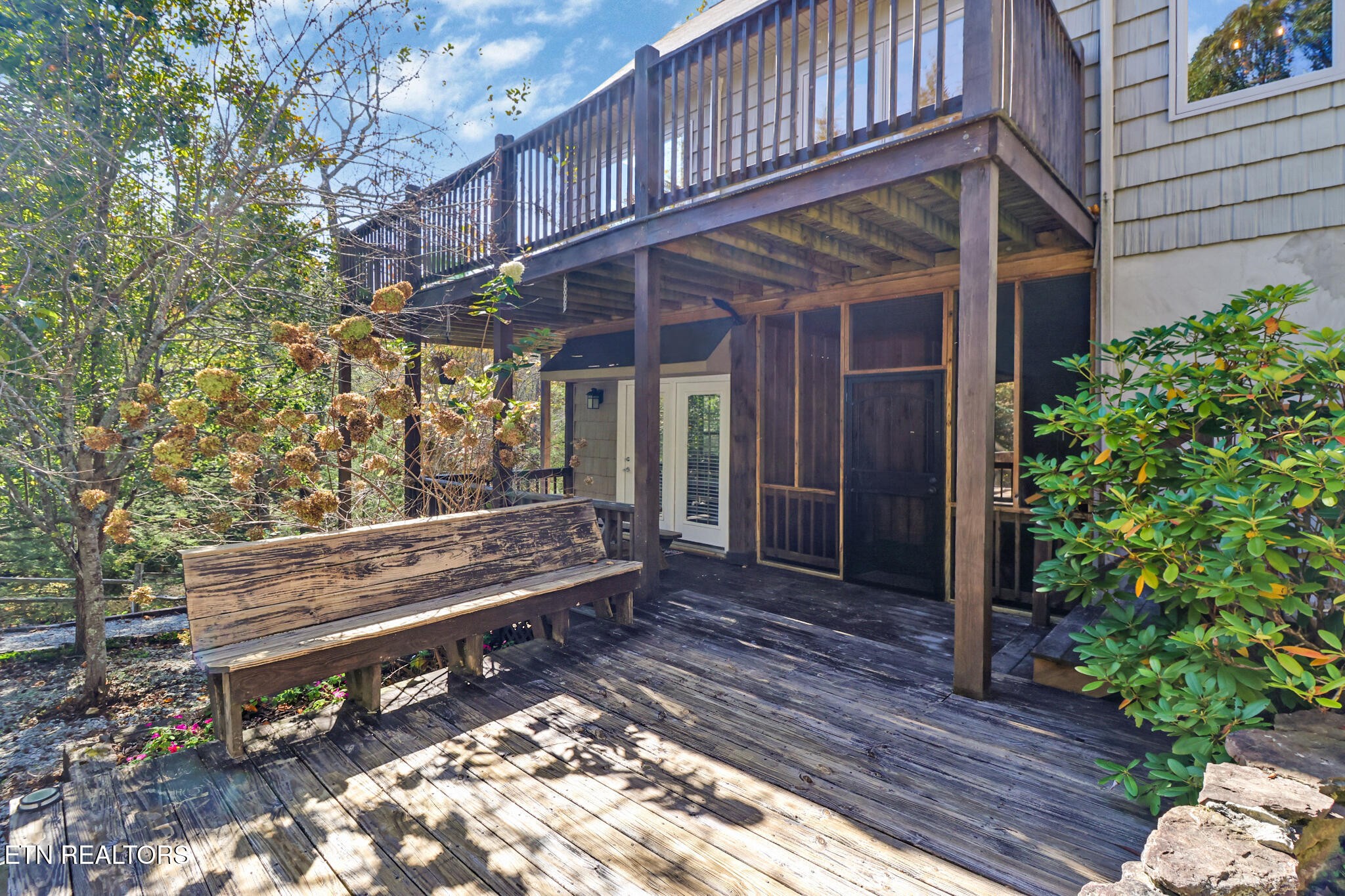 232 Victoria Circle Jamestown, TN 38556 - Photo 41 of 58 a view of a wooden bench in front of house
