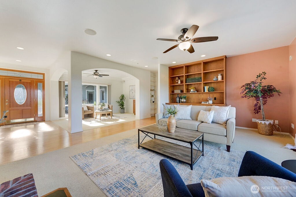275404 Highway 101 Sequim, WA 98382 - Photo 16 of 40 a living room with furniture and a large window