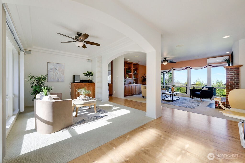 275404 Highway 101 Sequim, WA 98382 - Photo 10 of 40 a living room with furniture and a large window