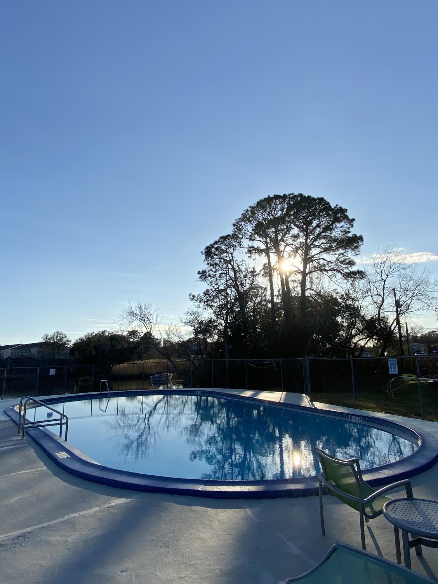 210 Pelham Road, Unit 107C Fort Walton Beach, FL 32547 - Photo 13 of 17 a view of roof deck with furniture