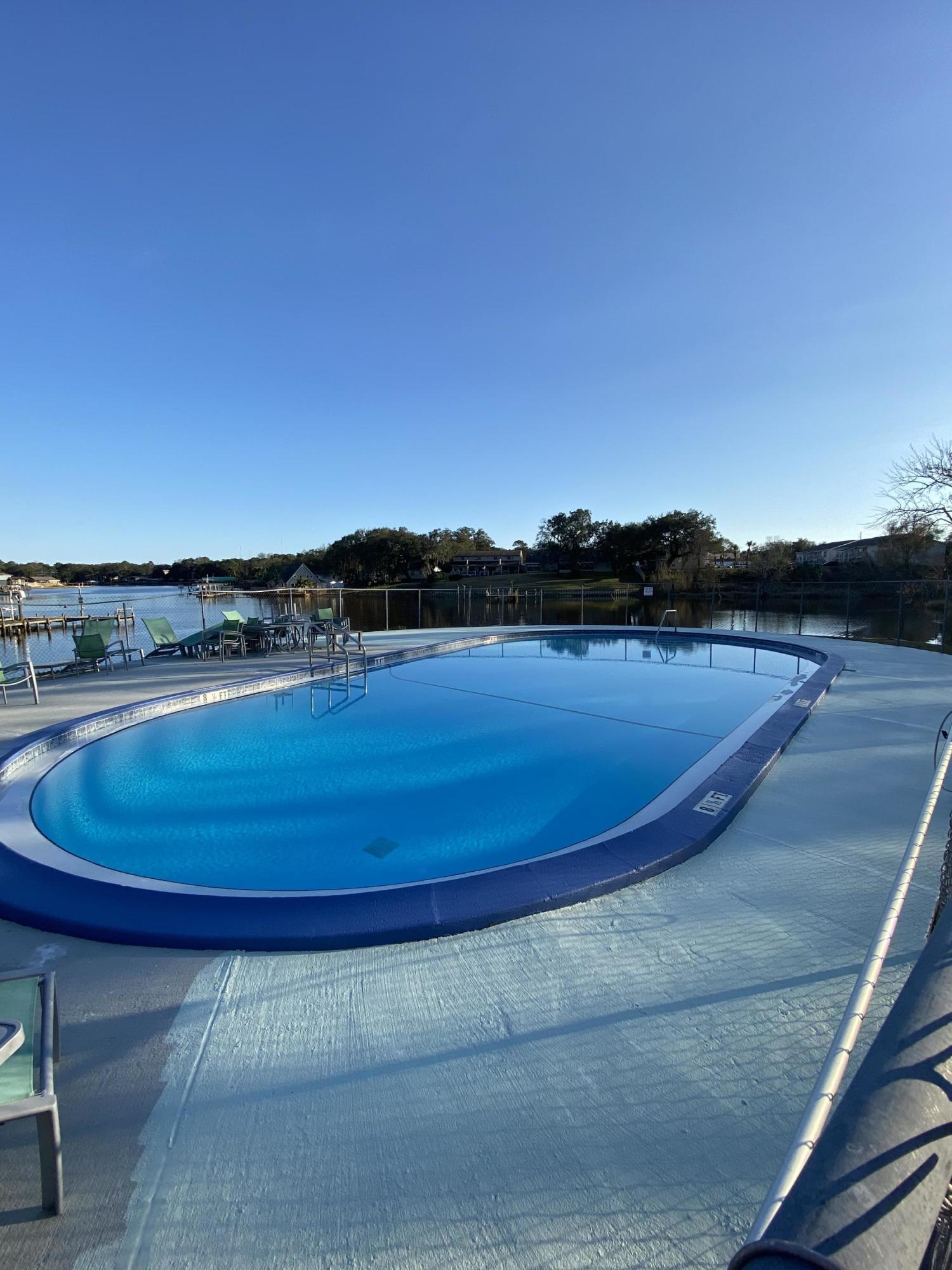 210 Pelham Road, Unit 107C Fort Walton Beach, FL 32547 - Photo 17 of 17 a view of outdoor space and yard