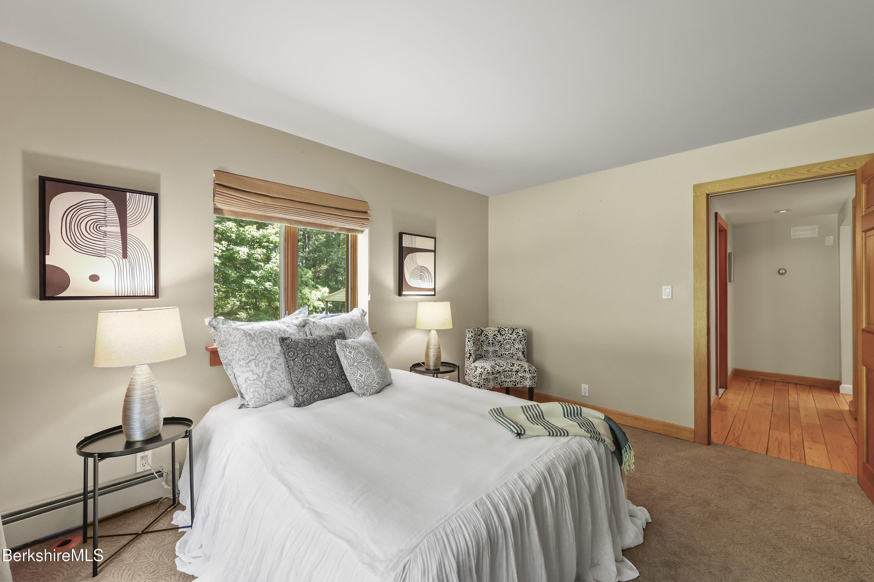 46 West Center Road West Stockbridge, MA 01266 - Photo 16 of 52 a bedroom with a bed and a lamp on table