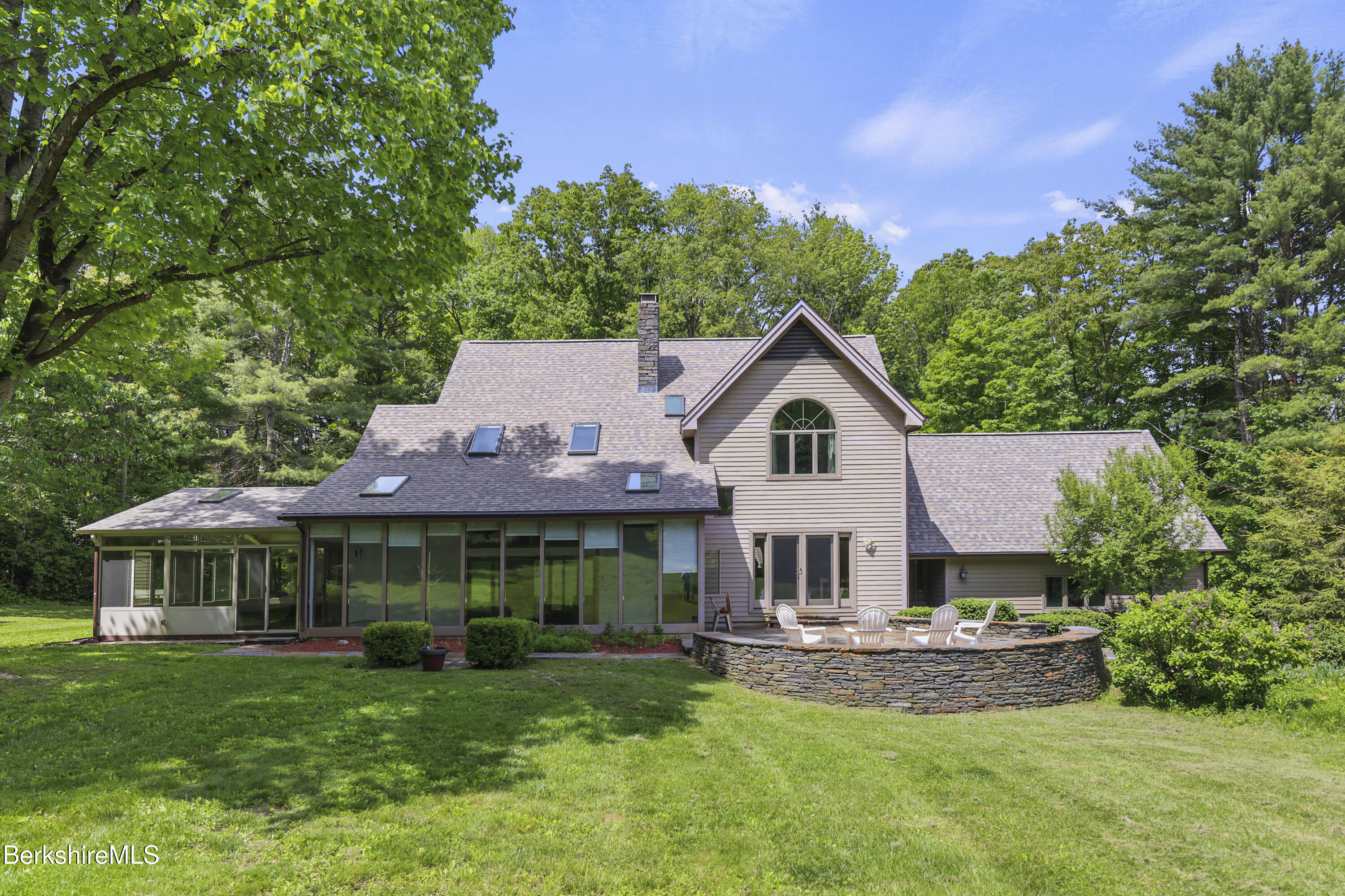 46 West Center Road West Stockbridge, MA 01266 - Photo 49 of 52 a front view of a house with a garden and trees