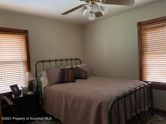 86 James Street Shavertown, PA 18708 - Photo 10 of 23 a bed sitting in a bedroom next to a window