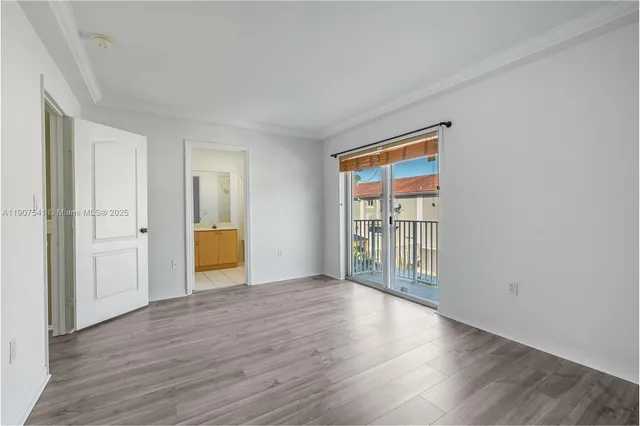 a view of a room that has a window in it