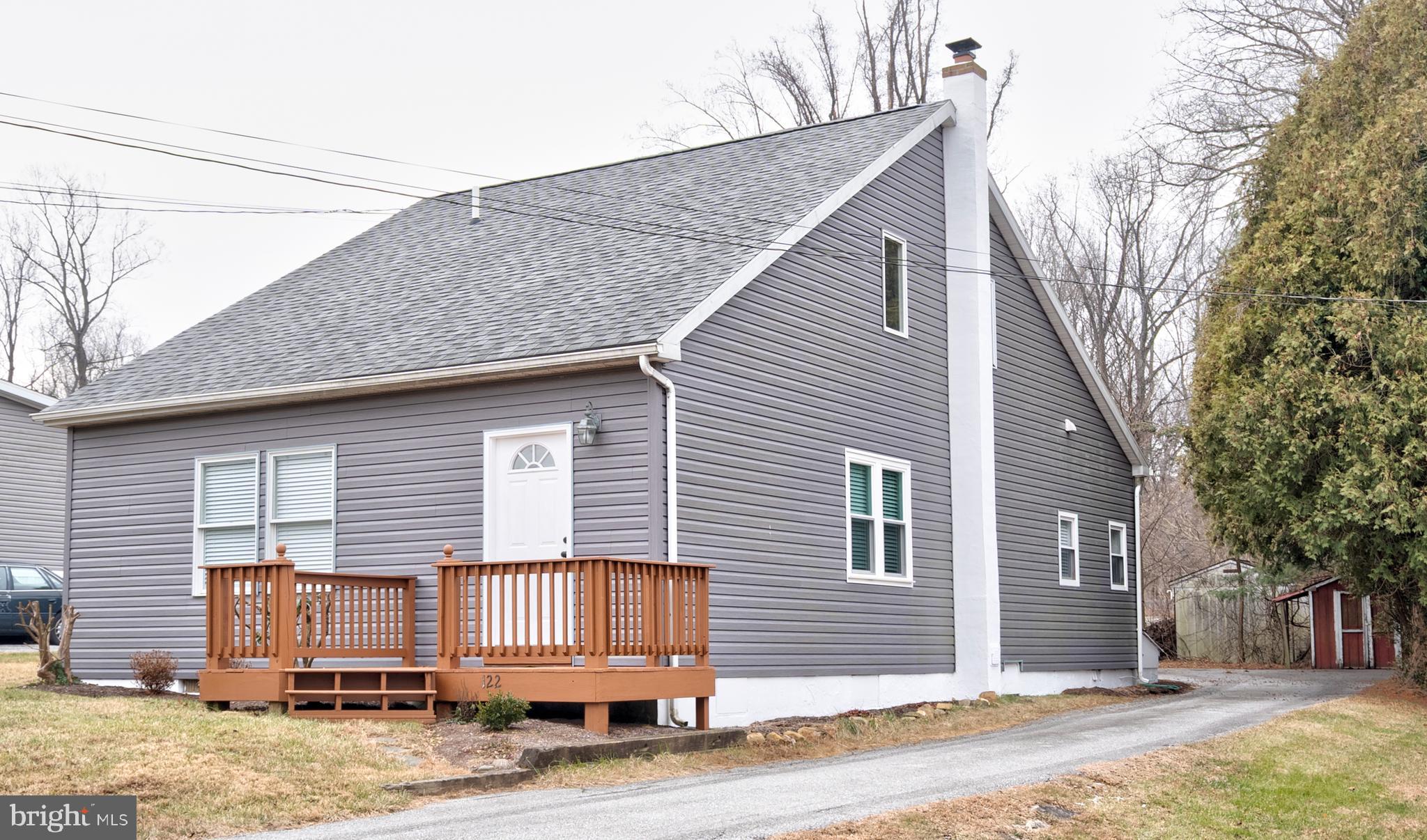 a front view of a house with a garage
