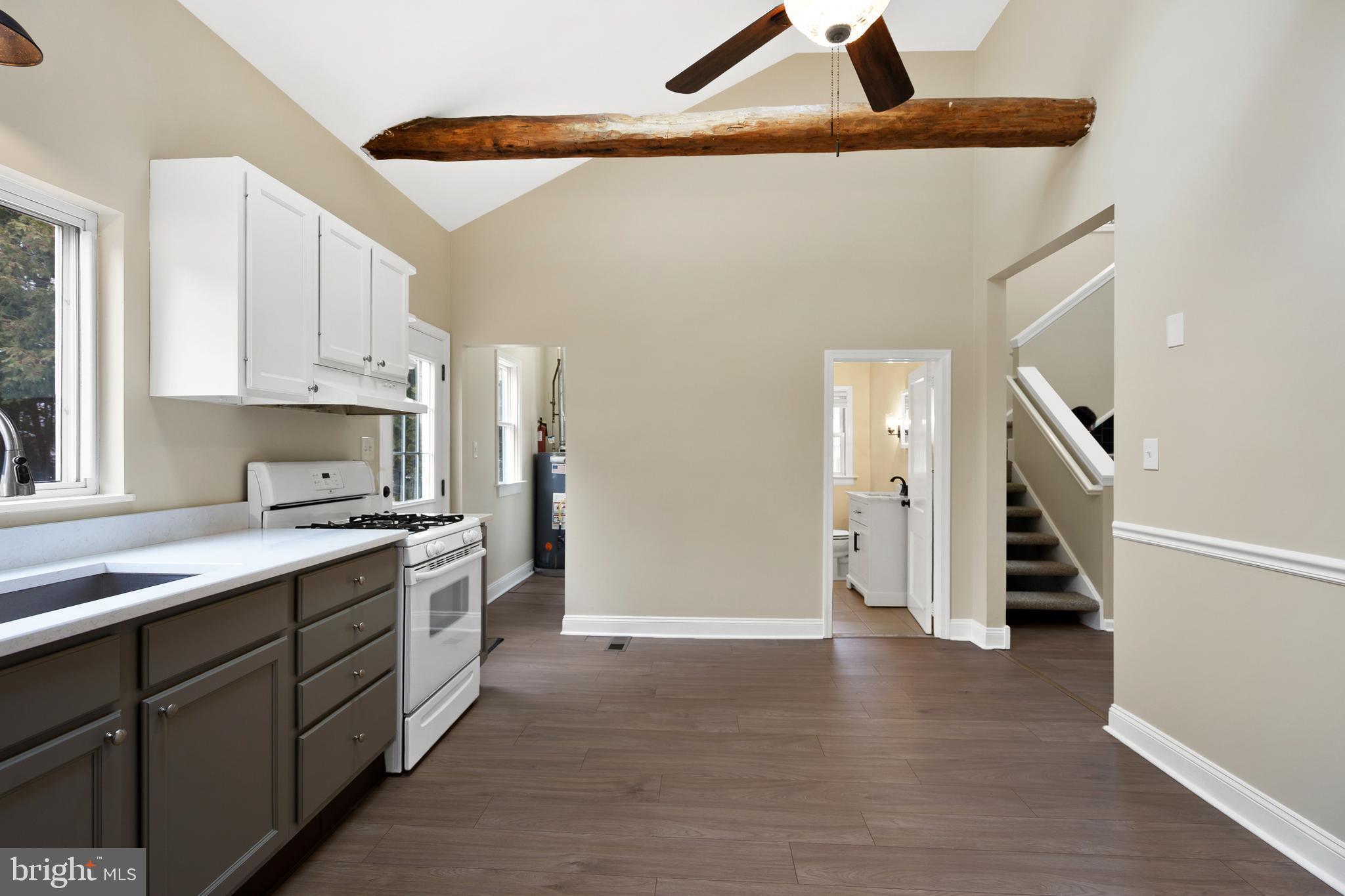 122 Garris Road Downingtown, PA 19335 - Photo 15 of 52 a kitchen with a sink and a stove top oven