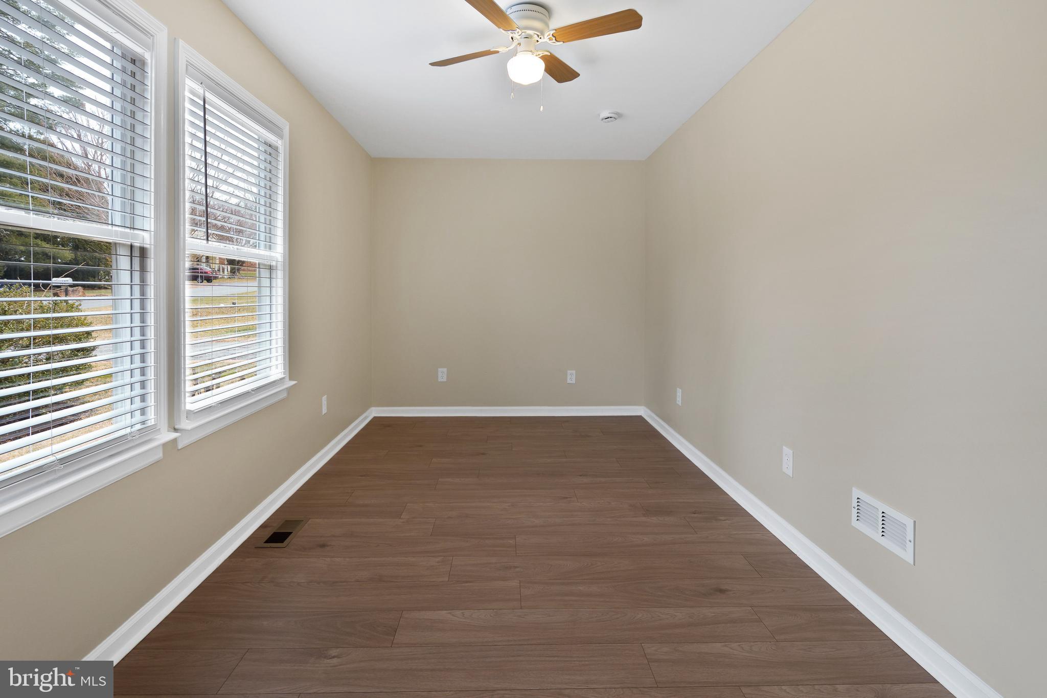 122 Garris Road Downingtown, PA 19335 - Photo 17 of 52 wooden floor in an empty room with a window