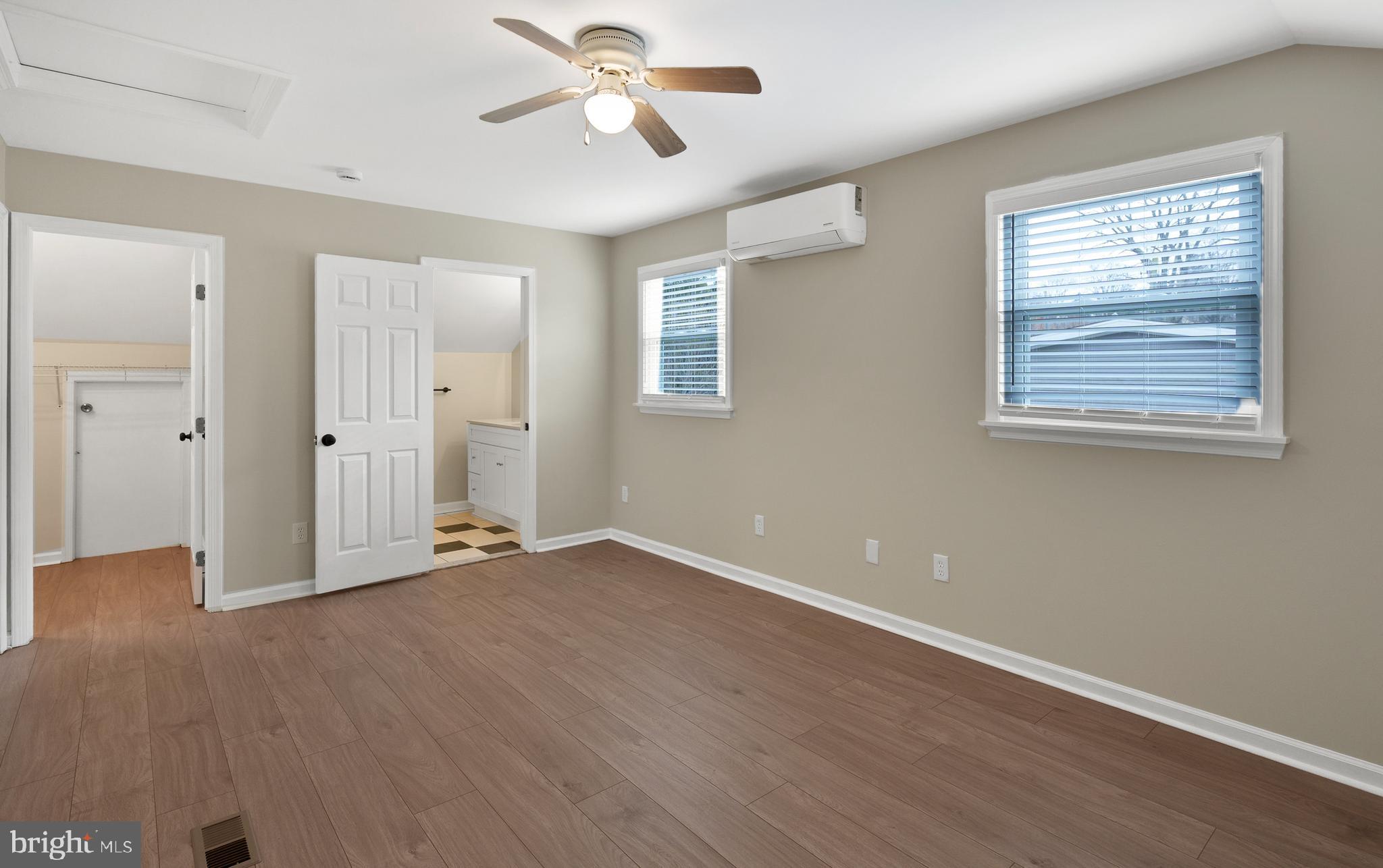122 Garris Road Downingtown, PA 19335 - Photo 28 of 52 a view of an empty room with wooden floor and a window