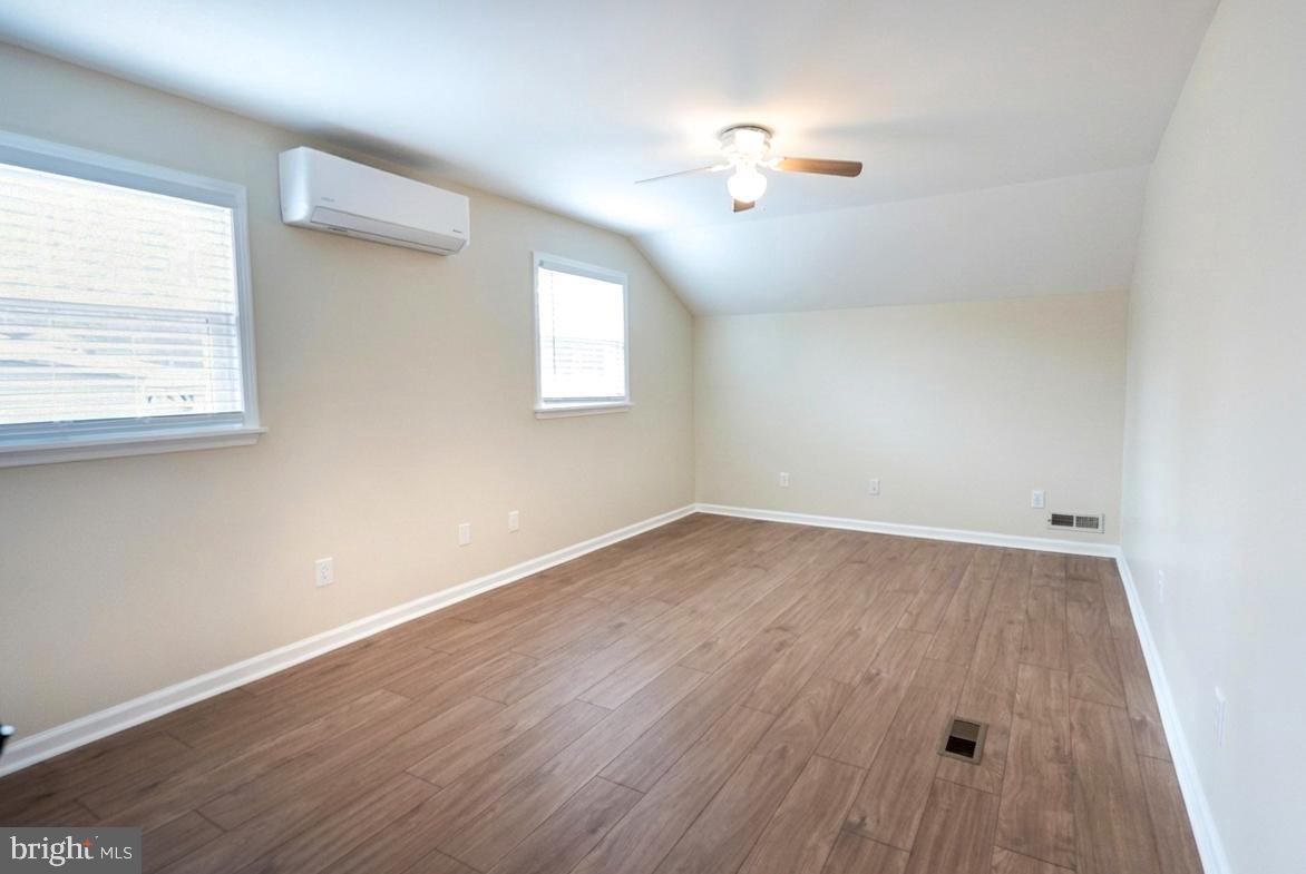 122 Garris Road Downingtown, PA 19335 - Photo 30 of 52 wooden floor in an empty room with a window