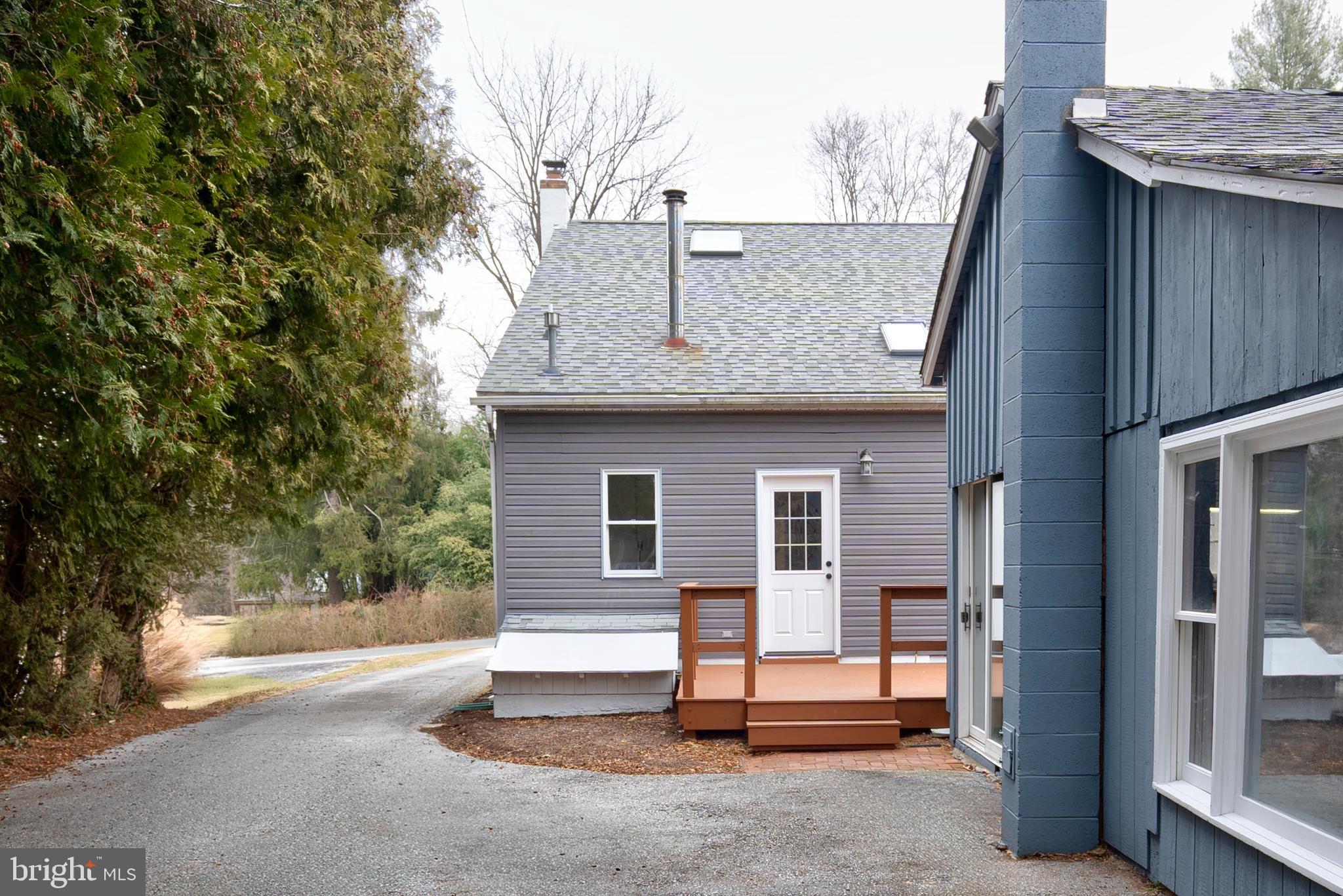 122 Garris Road Downingtown, PA 19335 - Photo 36 of 52 a view of backyard with cabin