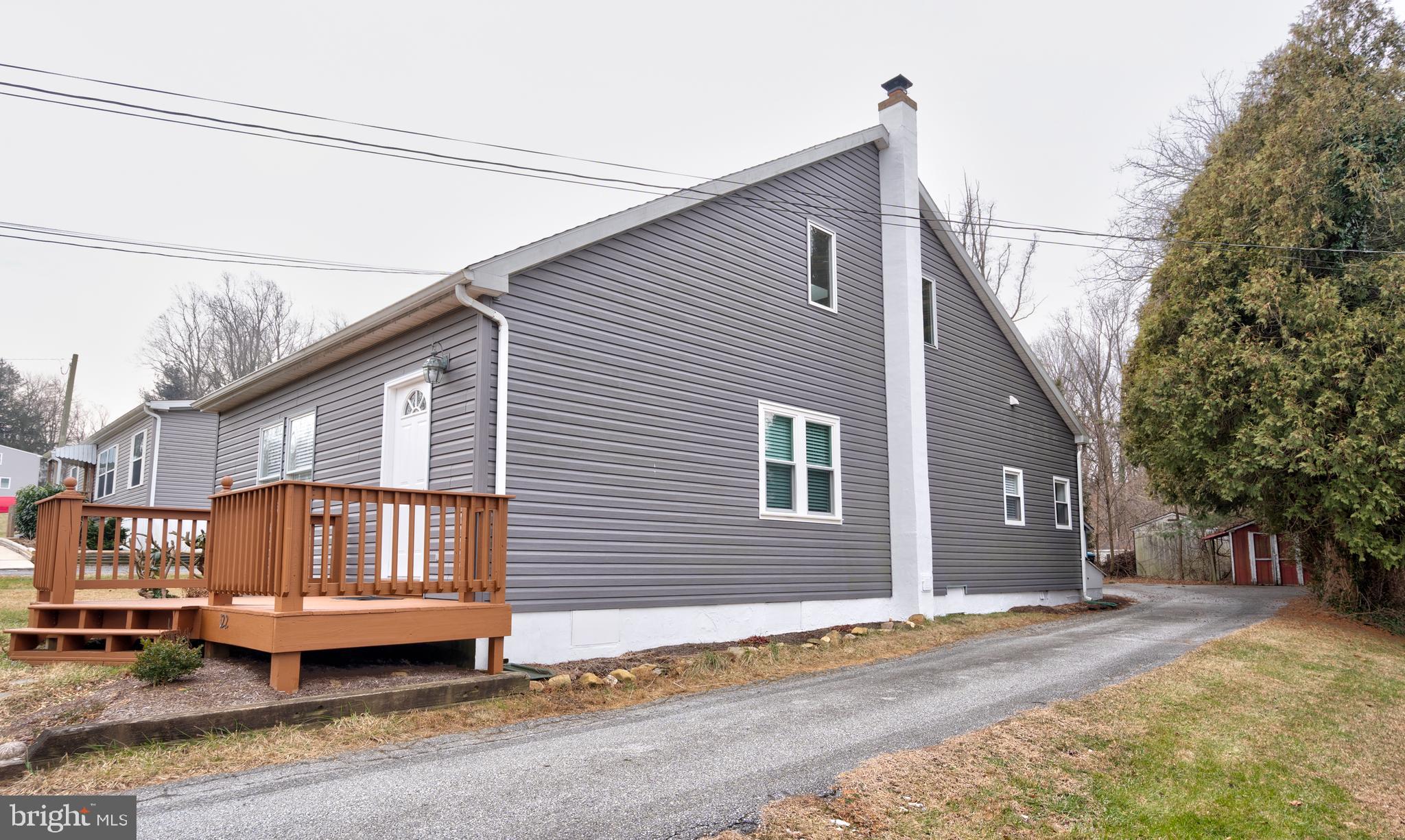 122 Garris Road Downingtown, PA 19335 - Photo 47 of 52 a view of a house with a patio