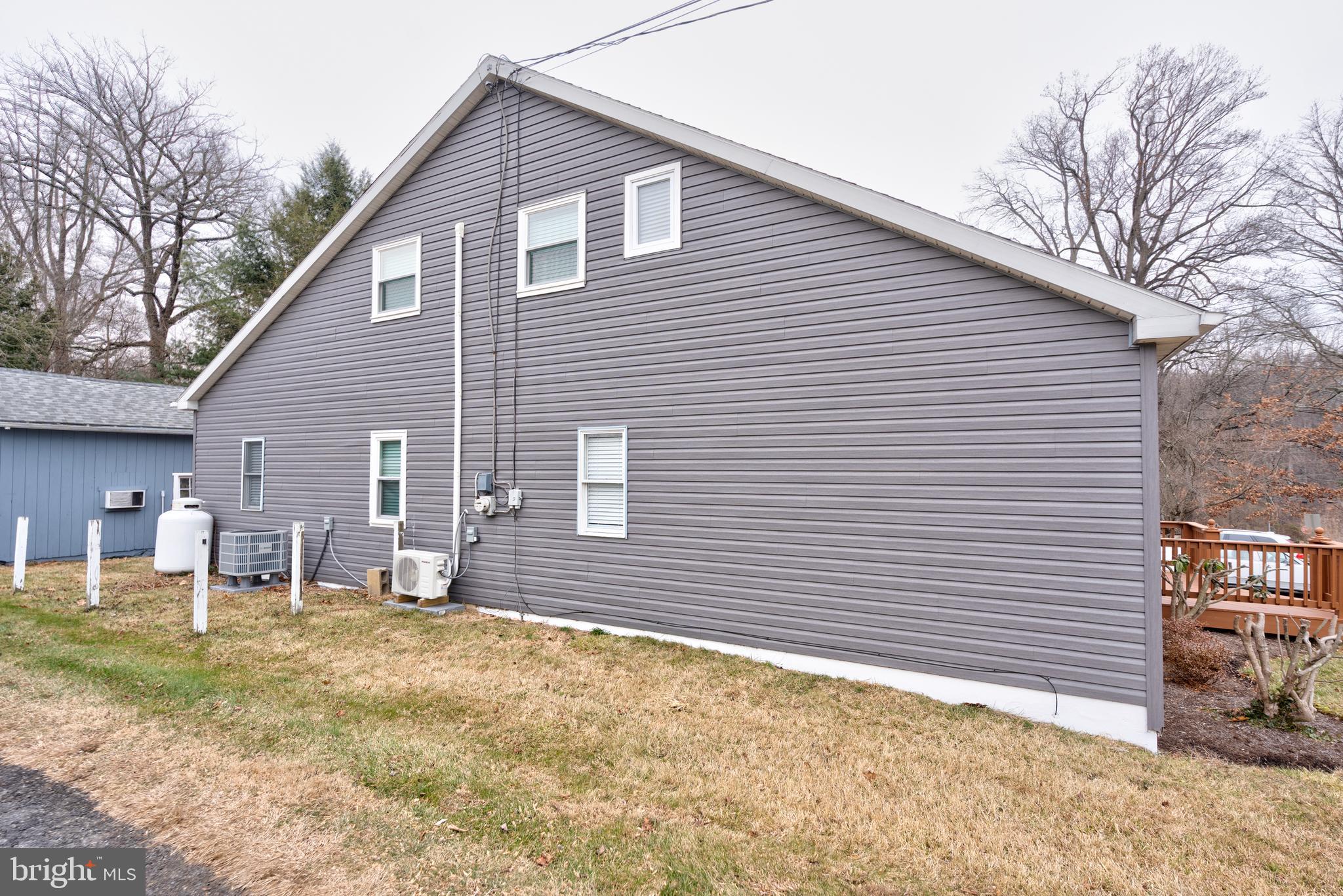 122 Garris Road Downingtown, PA 19335 - Photo 48 of 52 a view of a house with backyard and sitting area