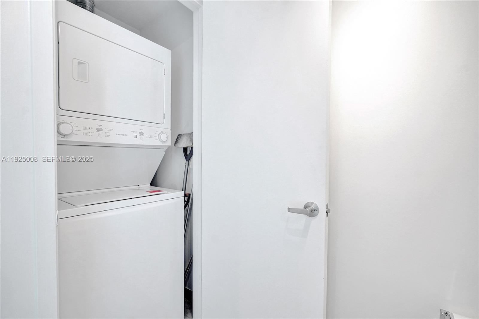 3301 Northeast 1st Avenue, Unit H2205 Miami, FL 33137 - Photo 15 of 28 a utility room with dryer and washer