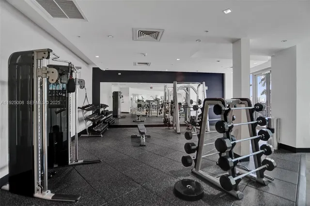 a view of a room with gym equipment