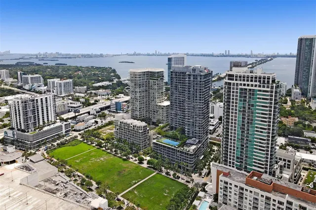 a view of a city with tall buildings