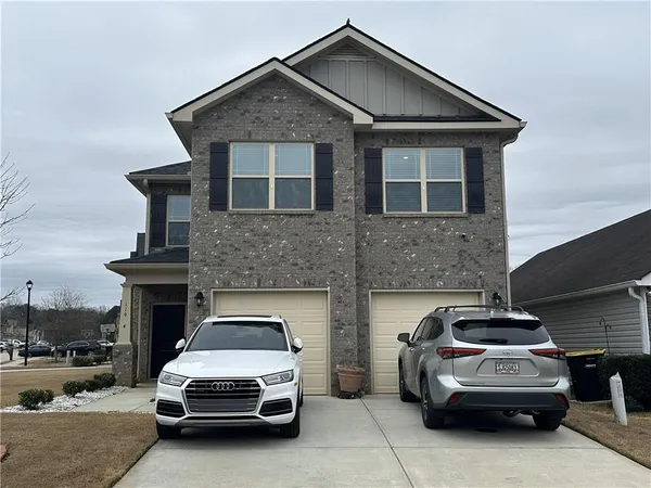 a car parked in front of a house
