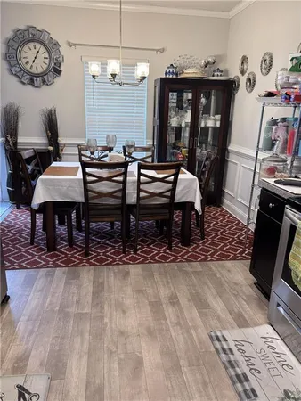 a living room with furniture a rug and a fireplace