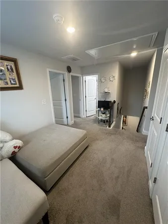 a bed room with a bed and furniture