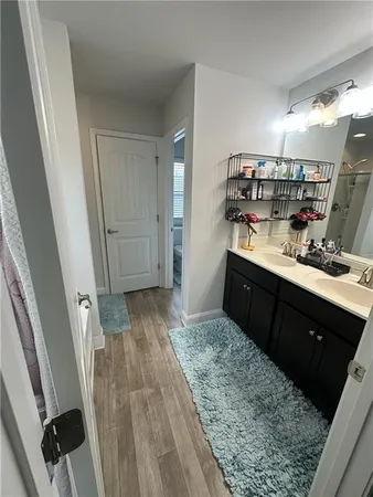 a bathroom with a tub and a shower