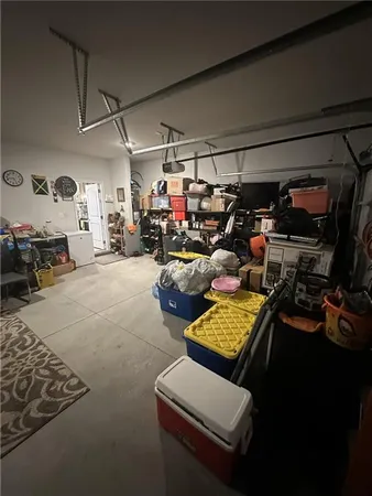 a living room with lots of furniture and a flat screen tv