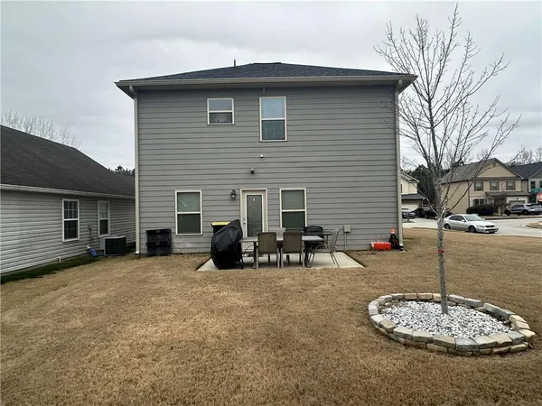 a view of the house with a entertaining space