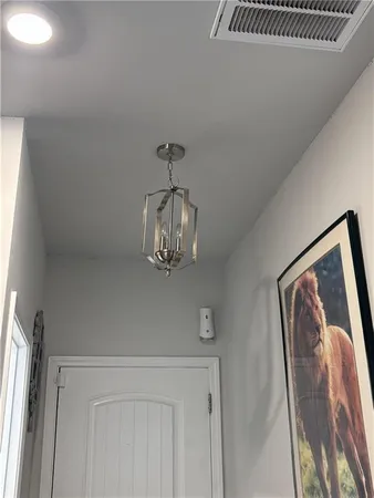 a view of a hallway with a small space