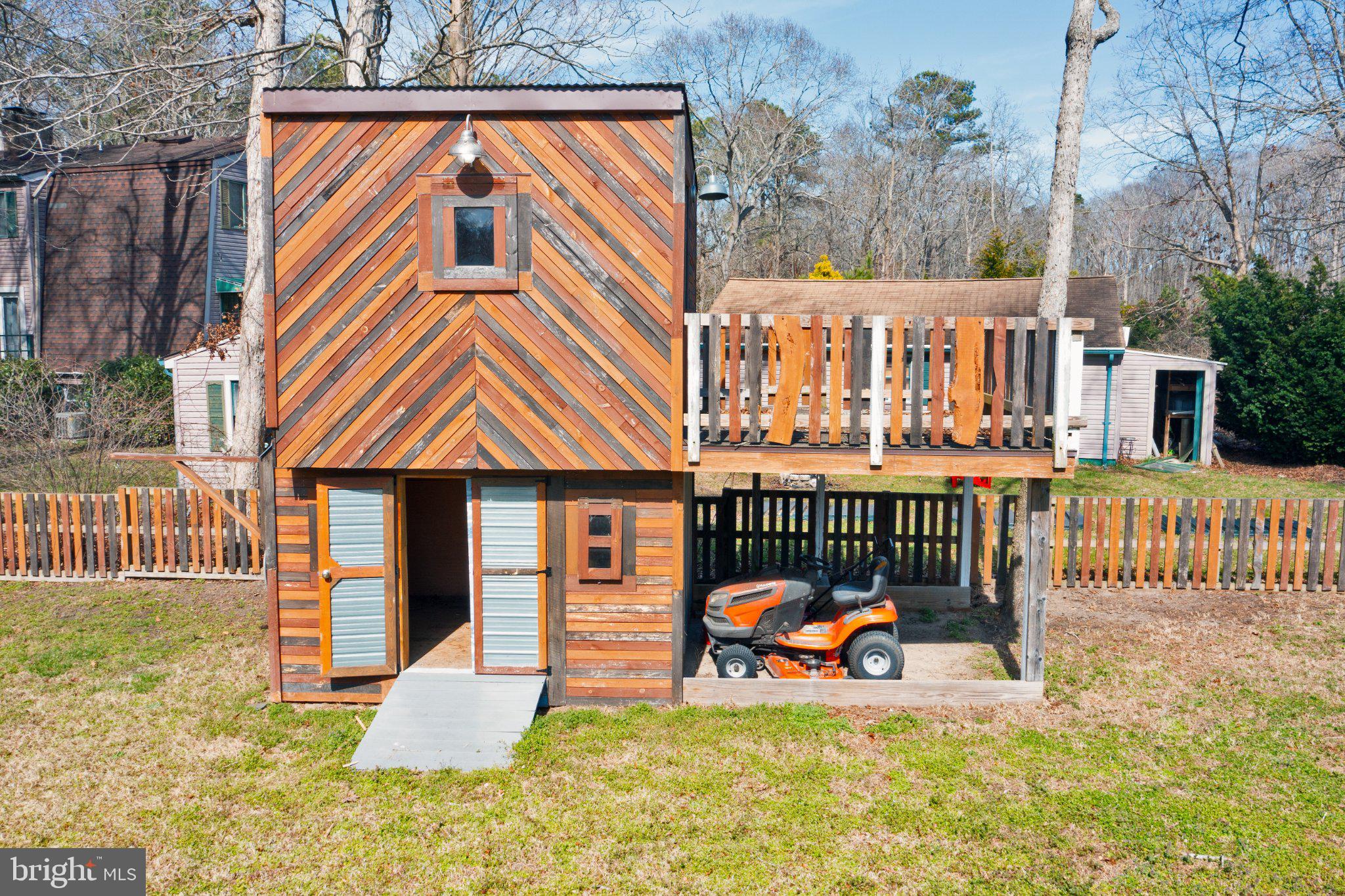 31765 Hickory Manor Road Frankford, DE 19945 - Photo 15 of 53 Charming playhouse with rustic flair.